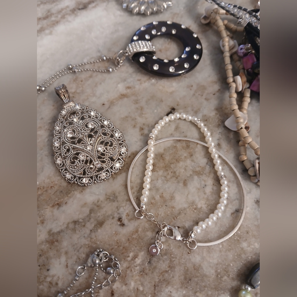 Lots Of Costume Jewelry.  Earings, Bracelets, Pins,..WILL ADD IN ANOTHER BUNCH.